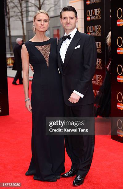 Clare Harding and Tom Chambers attends The Laurence Olivier Awards at The Royal Opera House on April 28, 2013 in London, England.