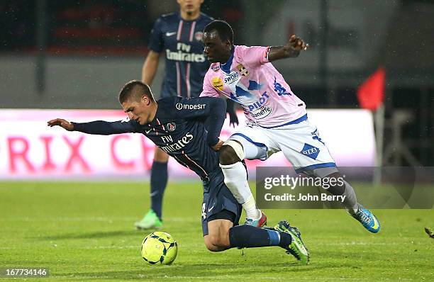 Marco Verratti of PSG and Mohammed Rabiu of ETG in action during the Ligue 1 match between Evian Thonon Gaillard FC, ETG, and Paris Saint Germain FC,...