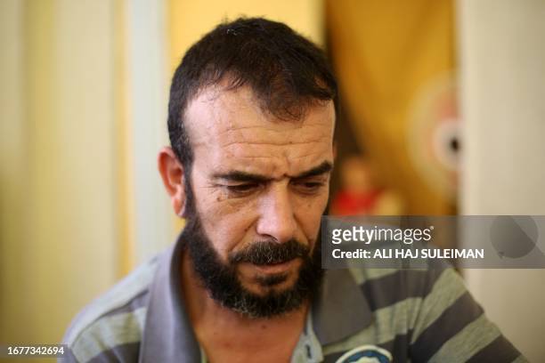 Idlib, Syria. 36-year-old Issam Al-Laham survived the chemical attack that occurred in Ghouta on 21 August 2013 but lost 8 family members including...