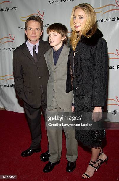 Actor Michael J. Fox, his son Sam and wife actress Tracy Pollan arrive at "A Funny Thing Happened On The Way To Cure Parkinson's" benefit gala on...