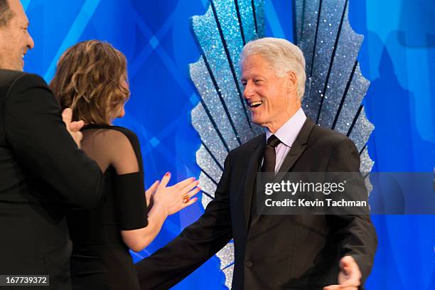 Producer Harvey Weinstein and actress Jennifer Lawrence presents Former President of the United States Bill Clinton with the Advocate for Change...