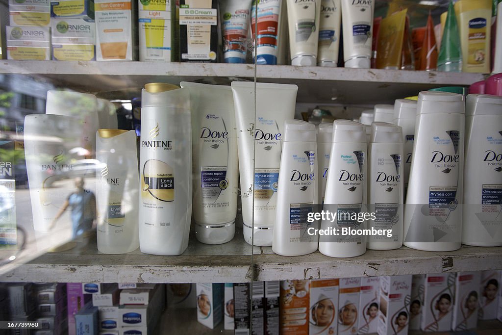 Bottles of Hindustan Unilever Ltd. Dove shampoo, right, are displayed...  News Photo - Getty Images