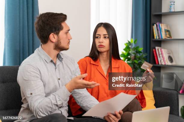 stressed caucasian couple, they are trying to get money to pay off their credit card debt. - demonstration against the marriage for all bill stock pictures, royalty-free photos & images