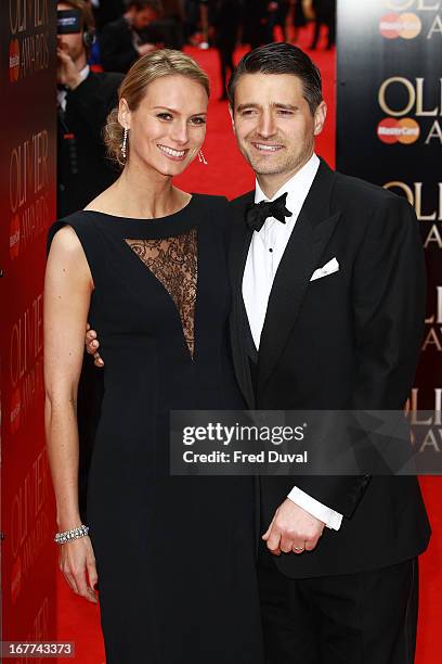 Clare Harding and Tom Chambers attend The Laurence Olivier Awards at The Royal Opera House on April 28, 2013 in London, England.