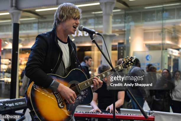 Singer-songwriter Adam Isaac performs at Station Sessions Festival 2014 at St Pancras Station on April 26, 2013 in London, England.