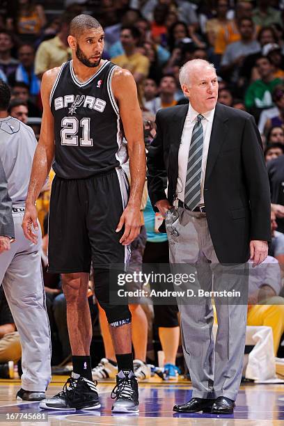 Head Coach Gregg Popovich of the San Antonio Spurs and Tim Duncan look on in Game Four of the Western Conference Quarterfinals against the Los...