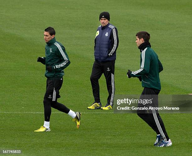 Head coach Jose Mourinho of Real Madrid CF watches Angel Di Maria and Alvaro B. Morata during a training session ahead of the UEFA Champions League...