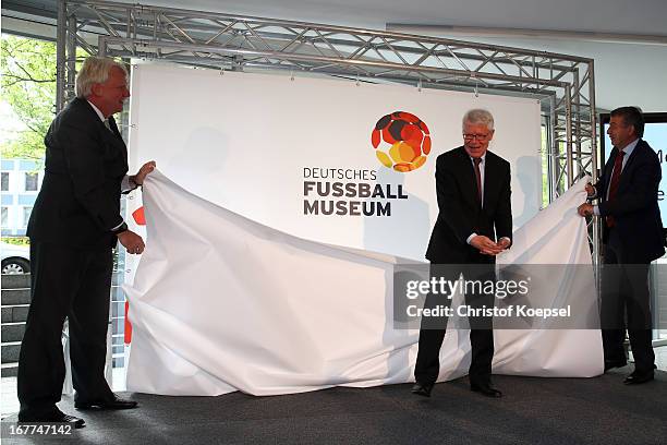 Ullrich Sierau, mayor of Dortmund, Reinhard Rauball, president of the DFL and Wolfgang Niersbach, president of the German Football Association unveil...