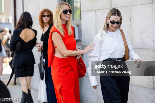 Lisa Aiken wears red shirt, skirt outside Gabriela Hearst on September 12, 2023 in New York City.