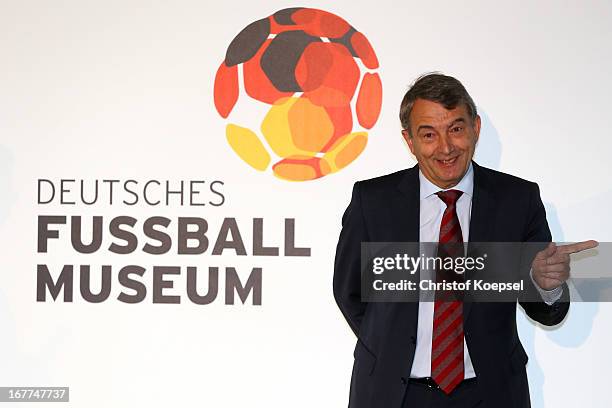 Wolfgang Niersbach, president of the German Football Association poses in front of the official logo of the DFB Football Museum during the DFB...