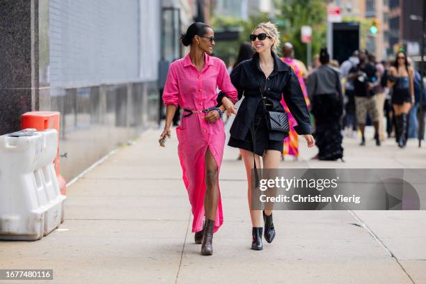 Meron Mamo wears pink button up dress Adey Abeba, boots Thursday, sunglasses Tahari & Lynn Anna Lafreniere wears black top Alexander Wang, skirt...