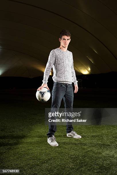 Footballer Oscar dos Santos Emboaba is photographed for the Guardian on March 8, 2013 in London, England.