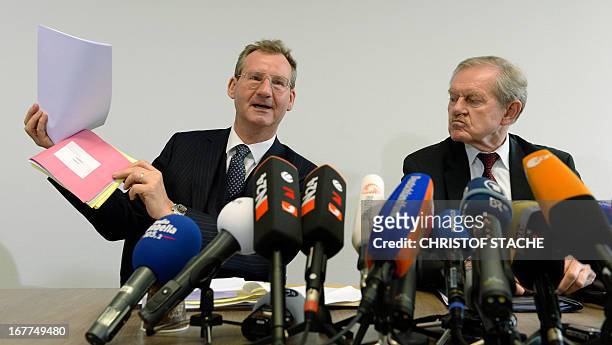 German notary Dieter Mayer and Karl Huber, President of the Higher Regional Court Munich , attend a press conference on April 29, 2013 in Munich,...