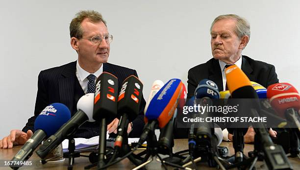 German notary Dieter Mayer and Karl Huber, President of the Higher Regional Court Munich , attend a press conference on April 29, 2013 in Munich,...