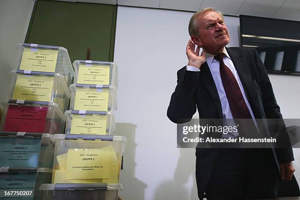 Karl Huber, President of the Oberlandgericht Muenchen reacts after a press conference following the lottery draw for the 50 media spots inside the...