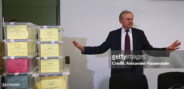 Karl Huber, President of the Oberlandgericht Muenchen reacts after a press conference following the lottery draw for the 50 media spots inside the...