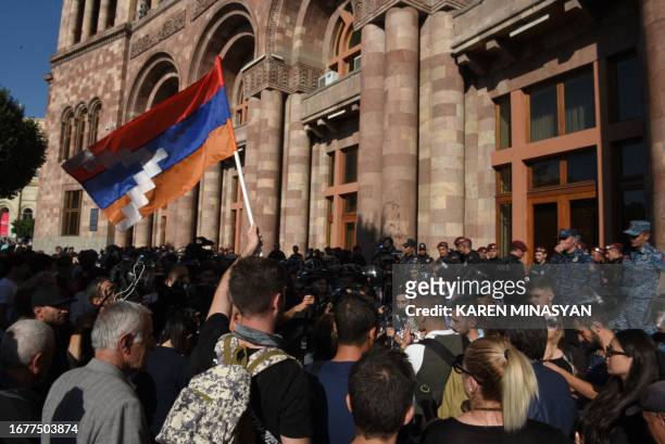 Protestors gather in downtown Yerevan on September 20 as separatists in Nagorno-Karabakh and Azerbaijan's authorities announced they would cease...