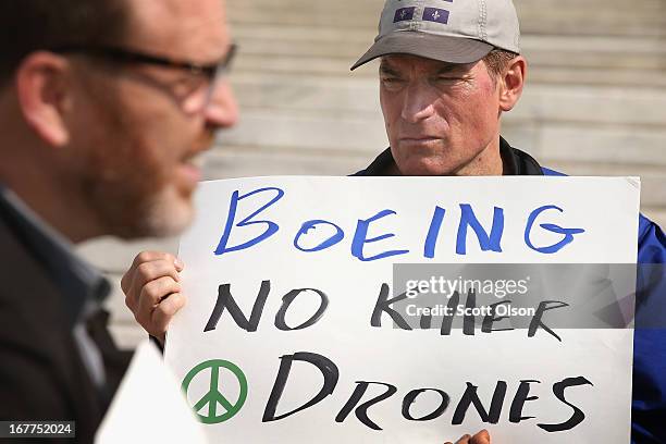 Demonstrators protest outside the Field Museum as shareholders arrive for The Boeing Company's annual meeting on April 29, 2013 in Chicago, Illinois....