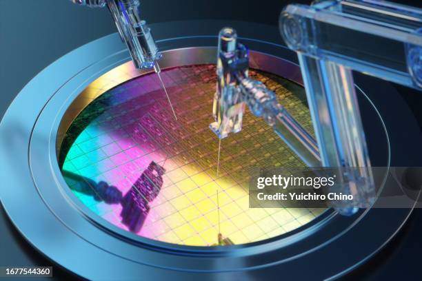 robot arm and semiconductor - chip stock-fotos und bilder