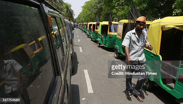 Auto Rickshaws and Taxis remain off the road demanding increase in the fare prices during the Auto Rickshaw and Taxi Adhikar Rally at Rajghat on...