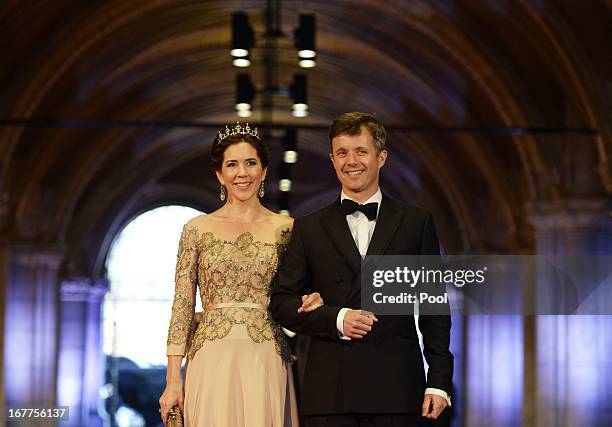 Princess Mary of Denmark and Prince Frederik of Denmark arrive to attend a dinner hosted by Queen Beatrix of The Netherlands ahead of her abdication...