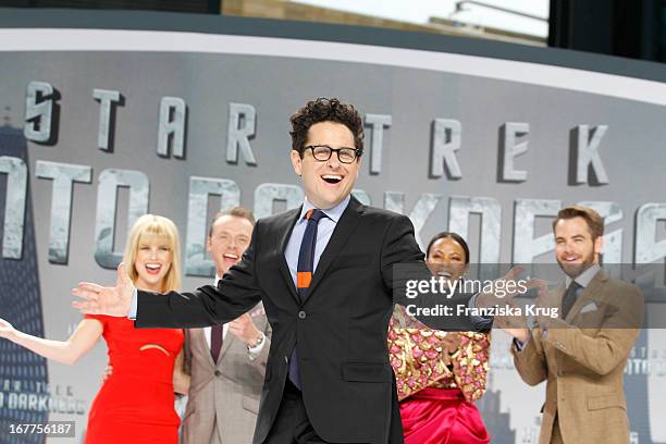 Abrams with Alice Eve, Simon Pegg, Zoe Saldana and Chris Pine attend the 'Star Trek Into Darkness' German Premiere at Cinestar on April 29, 2013 in...