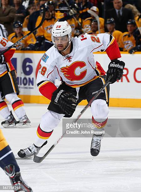 Akim Aliu of the Calgary Flames skates against the Nashville Predators during an NHL game at the Bridgestone Arena on April 23, 2013 in Nashville,...