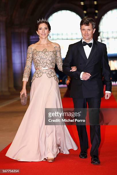 Crown Princess Mary of Denmark and Crown Prince Frederik of Denmark arrive at a dinner hosted by Queen Beatrix of The Netherlands ahead of her...