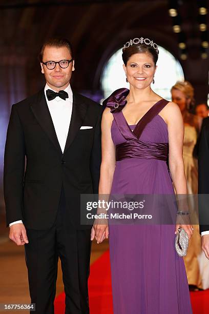 Prince Daniel of Sweden and Crown Princess Victoria of Sweden attend a dinner hosted by Queen Beatrix of The Netherlands ahead of her abdication at...