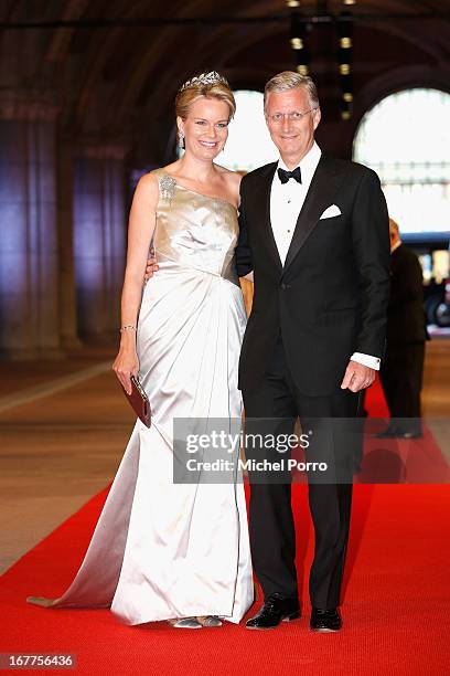 Princess Mathilde of Belgium and Prince Philippe of Belgium attend a dinner hosted by Queen Beatrix of The Netherlands ahead of her abdication at...