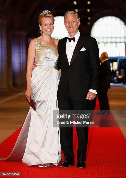 Princess Mathilde of Belgium and Prince Philippe of Belgium attend a dinner hosted by Queen Beatrix of The Netherlands ahead of her abdication at...