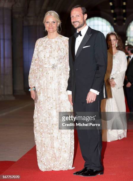 Princess Mette-Marit of Norway and Crown Prince Haakon of Norway attend a dinner hosted by Queen Beatrix of The Netherlands ahead of her abdication...