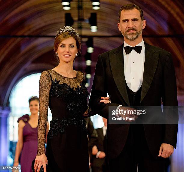 Princess Letizia of Spain and Prince Felipe of Spain arrive to attend a dinner hosted by Queen Beatrix of The Netherlands ahead of her abdication at...