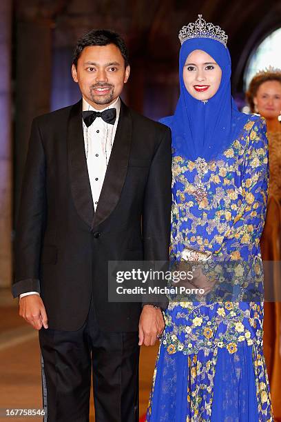 Crown Prince Al-Muhtadee Billah and Princess Sarah of Brunei attend a dinner hosted by Queen Beatrix of The Netherlands ahead of her abdication in...