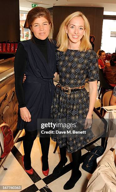 Amber Nuttall and Victoria Pattinson attend the launch of Cash & Rocket, in aid of the Rush to Zero campaign, at Banca Restaurant on April 29, 2013...