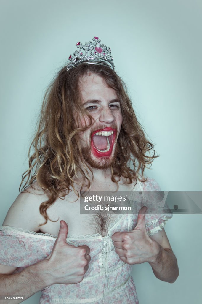 Stoked Male Prom queen in drag tiara on head lipstick