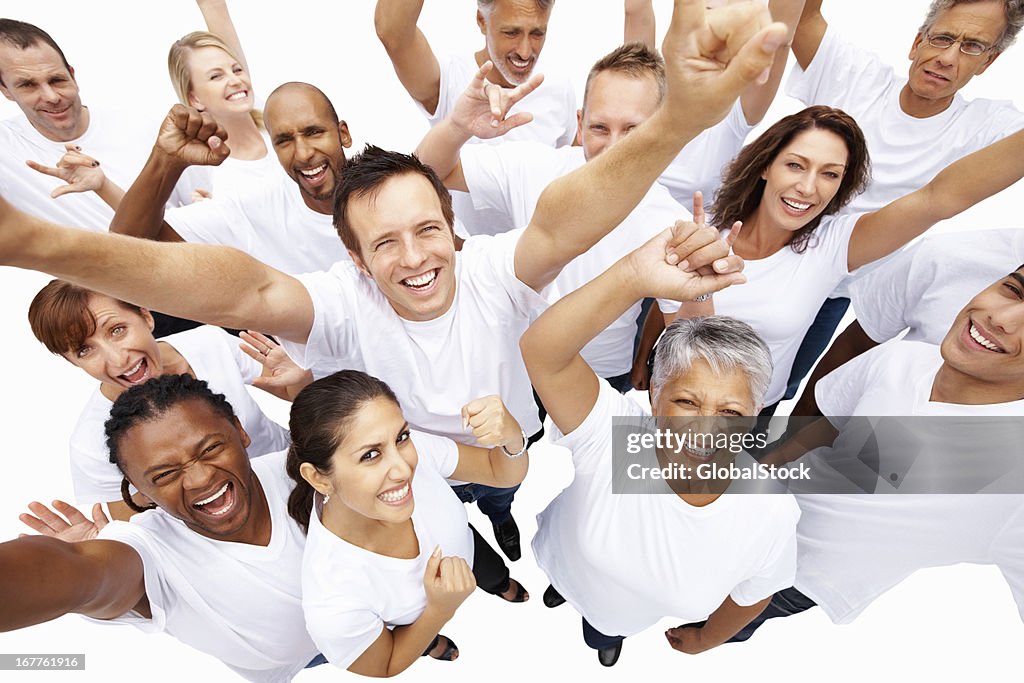 Multi ethnic people cheering