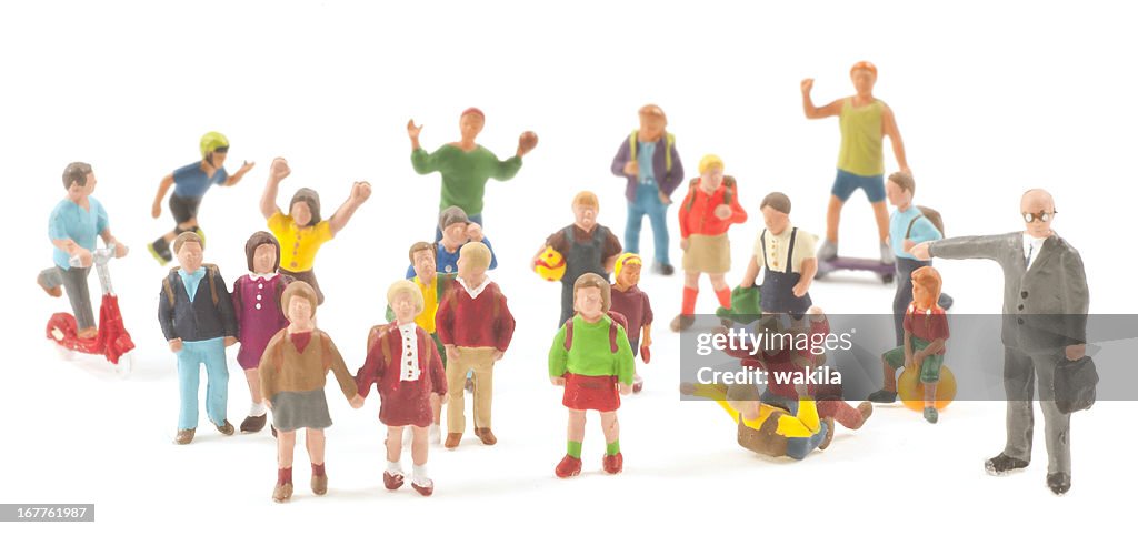Teaching Abstract Figure Teaching Teacher With Pupils Abstract Figurines At School High-Res ...