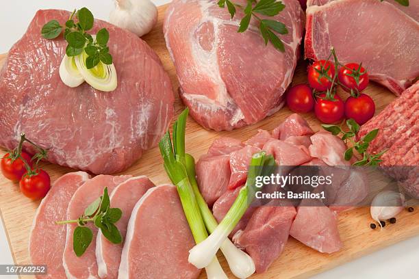 raw meat with garnish - kalfsvlees stockfoto's en -beelden