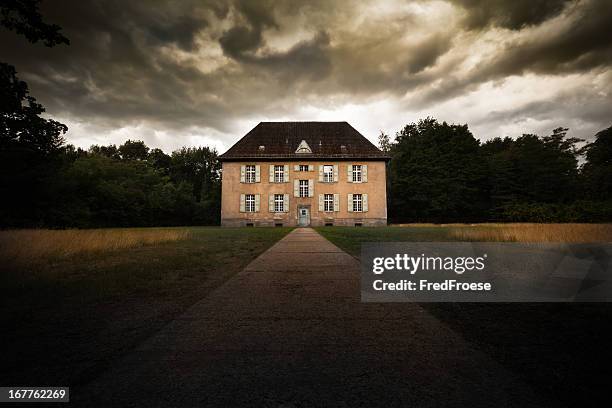abandoned house with dramatic sky - spooky stock pictures, royalty-free photos & images