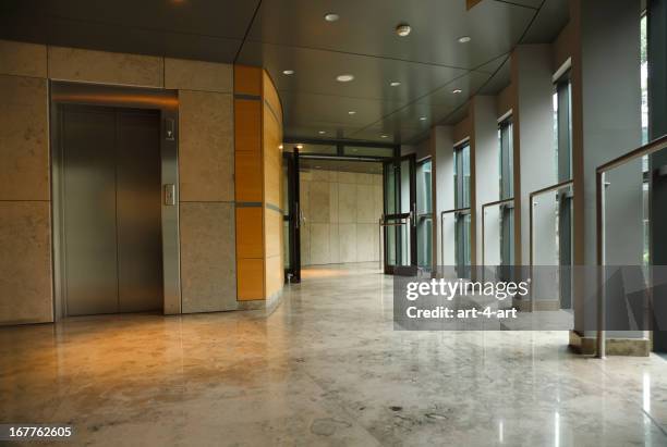 modern office building interior - apartment corridor stock pictures, royalty-free photos & images