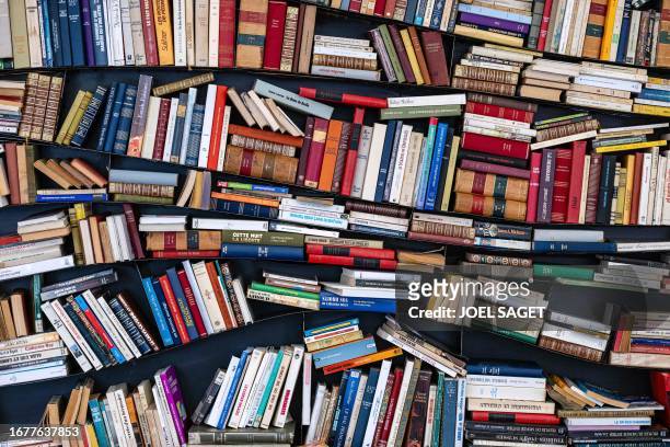 This photograph taken on September 20 shows a bookshelf set up in the street during the 25th edition of the "Les Correspondances" literary festival...