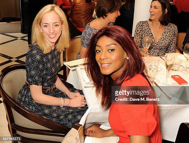 Victoria Pattinson and Phoebe Vela attend the launch of Cash & Rocket, in aid of the Rush to Zero campaign, at Banca Restaurant on April 29, 2013 in...