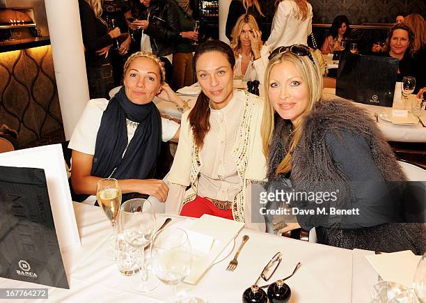 Guest, Lilly Becker and Caprice Bourret attend the launch of Cash & Rocket, in aid of the Rush to Zero campaign, at Banca Restaurant on April 29,...