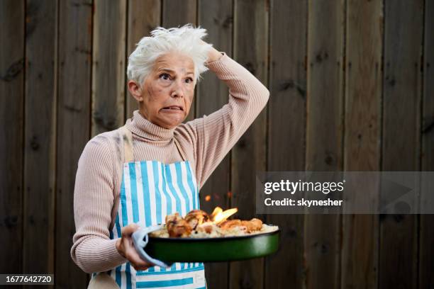 i burnt the dinner! - ruined dinner stock pictures, royalty-free photos & images