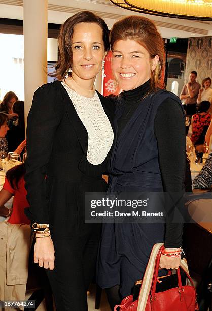 Julie Brangstrup and Amber Nuttall attend the launch of Cash & Rocket, in aid of the Rush to Zero campaign, at Banca Restaurant on April 29, 2013 in...