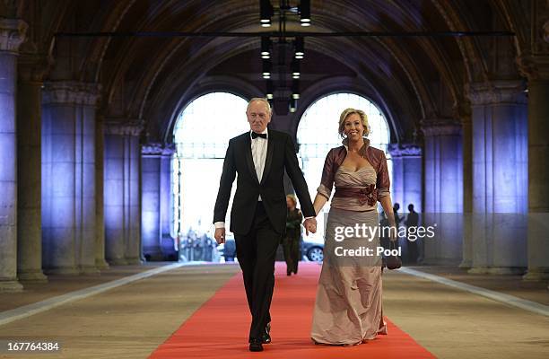 Johan Remkes and his wife arrive at a dinner hosted by Queen Beatrix of The Netherlands ahead of her abdication at Rijksmuseum on April 29, 2013 in...