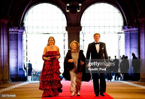 Princess Maxima of the Netherlands, Queen Beatrix of the Netherlands and Prince Willem-Alexander of the Netherlands arrive at a dinner hosted by...