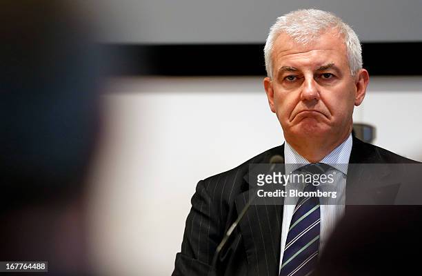 Alessandro Profumo, chairman of Banca Monte dei Paschi di Siena SpA, listens during a news conference following the company's annual general meeting...