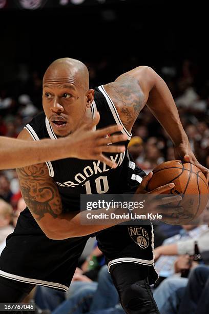 Keith Bogans of the Brooklyn Nets controls the ball against the Cleveland Cavaliers at The Quicken Loans Arena on April 3, 2013 in Cleveland, Ohio....